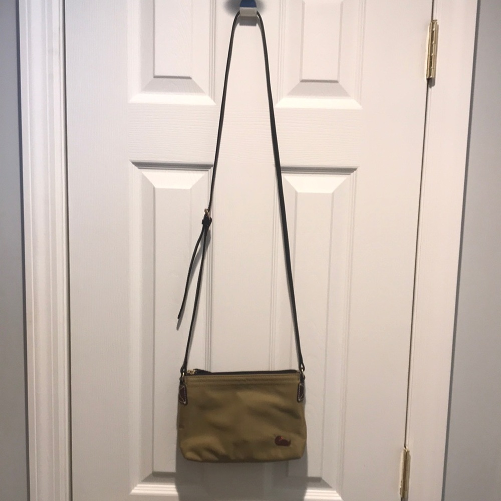 Dooney & Bourke khaki Crossbody bag.